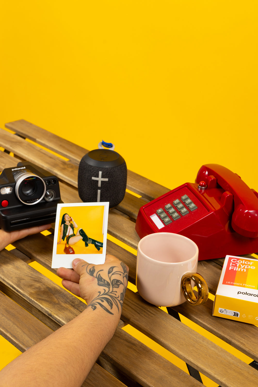 YELLOW BACKDROP RED PHONE SHOOT