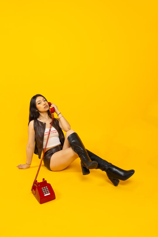 YELLOW BACKDROP RED PHONE SHOOT